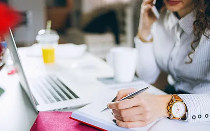 Woman at laptop 415x260